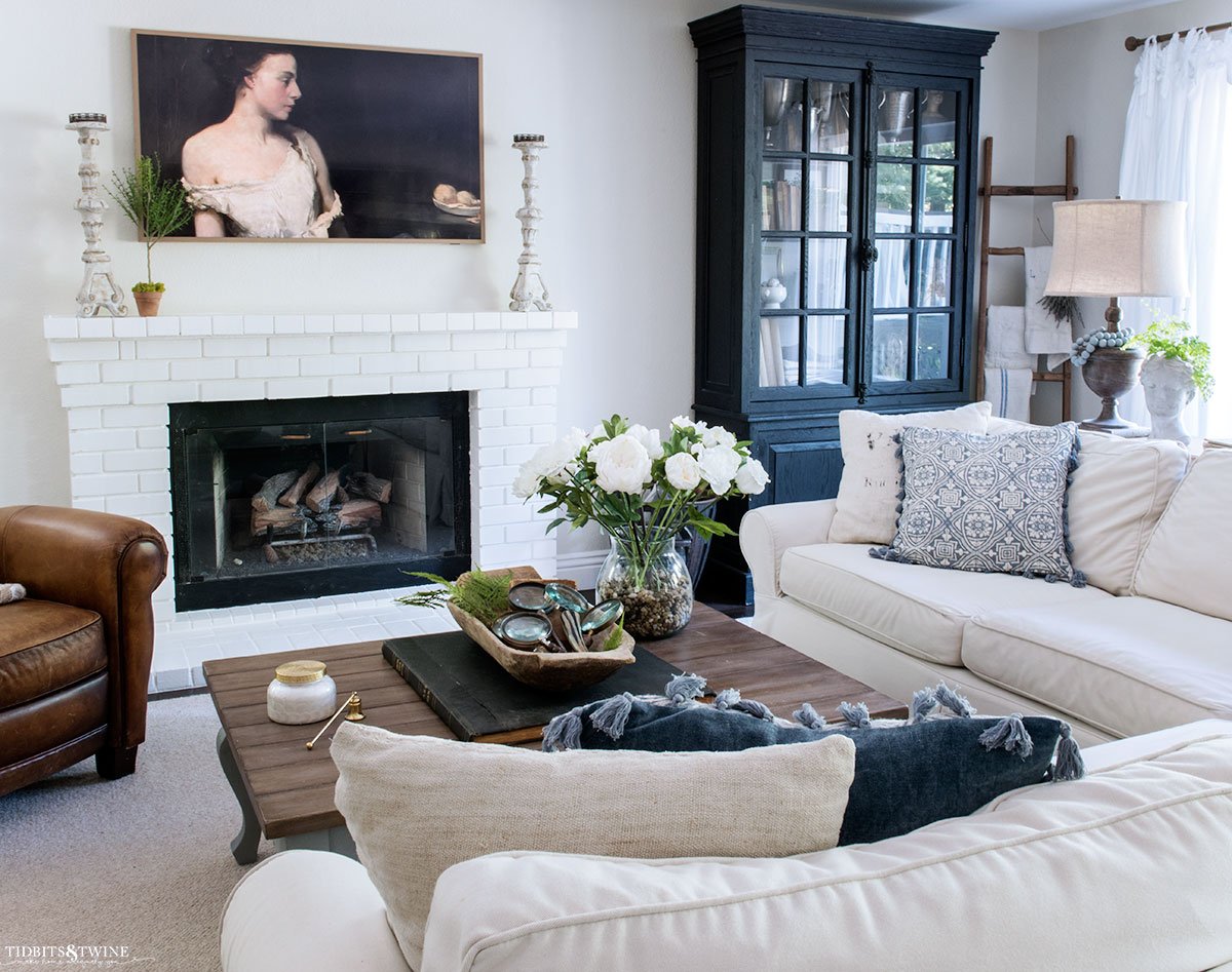 neutral spring family room with sectional sofa leather reclimer and the frame tv