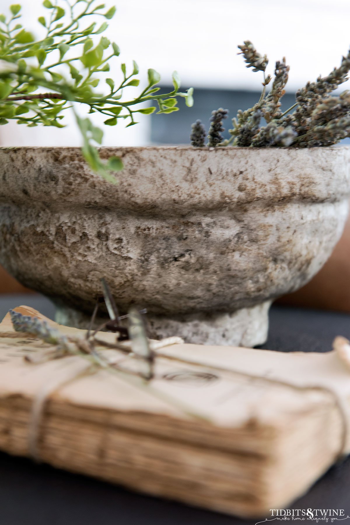 diy rustic paper mache bowl with old book and glasses in front