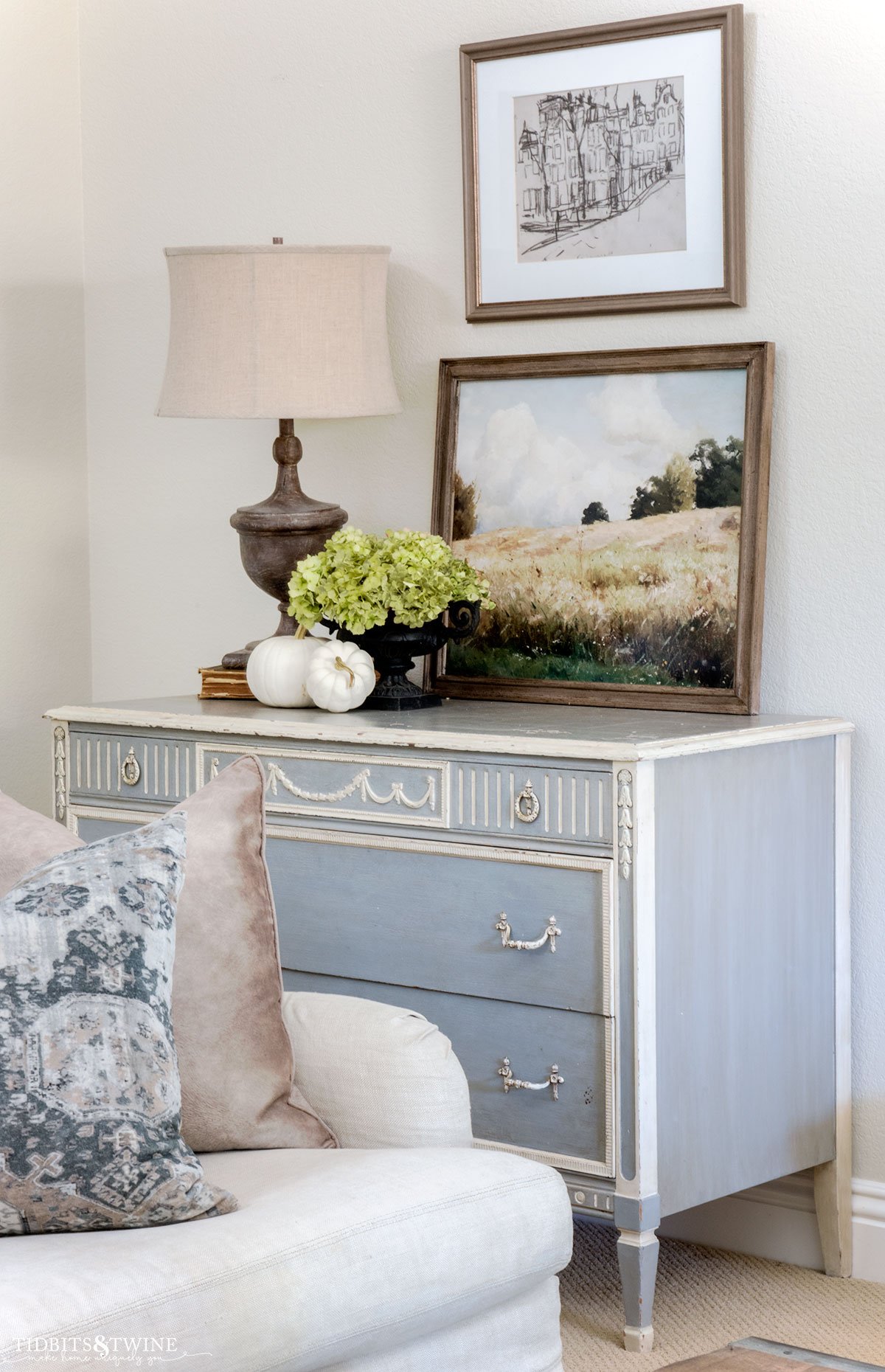 blue french dresser with lamp, pumpkins, hydrangea and Fall art on top