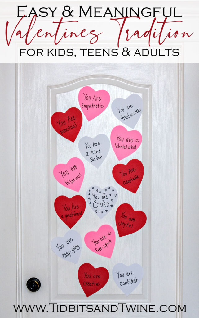 red white and pink paper hearts on door for valentine's day