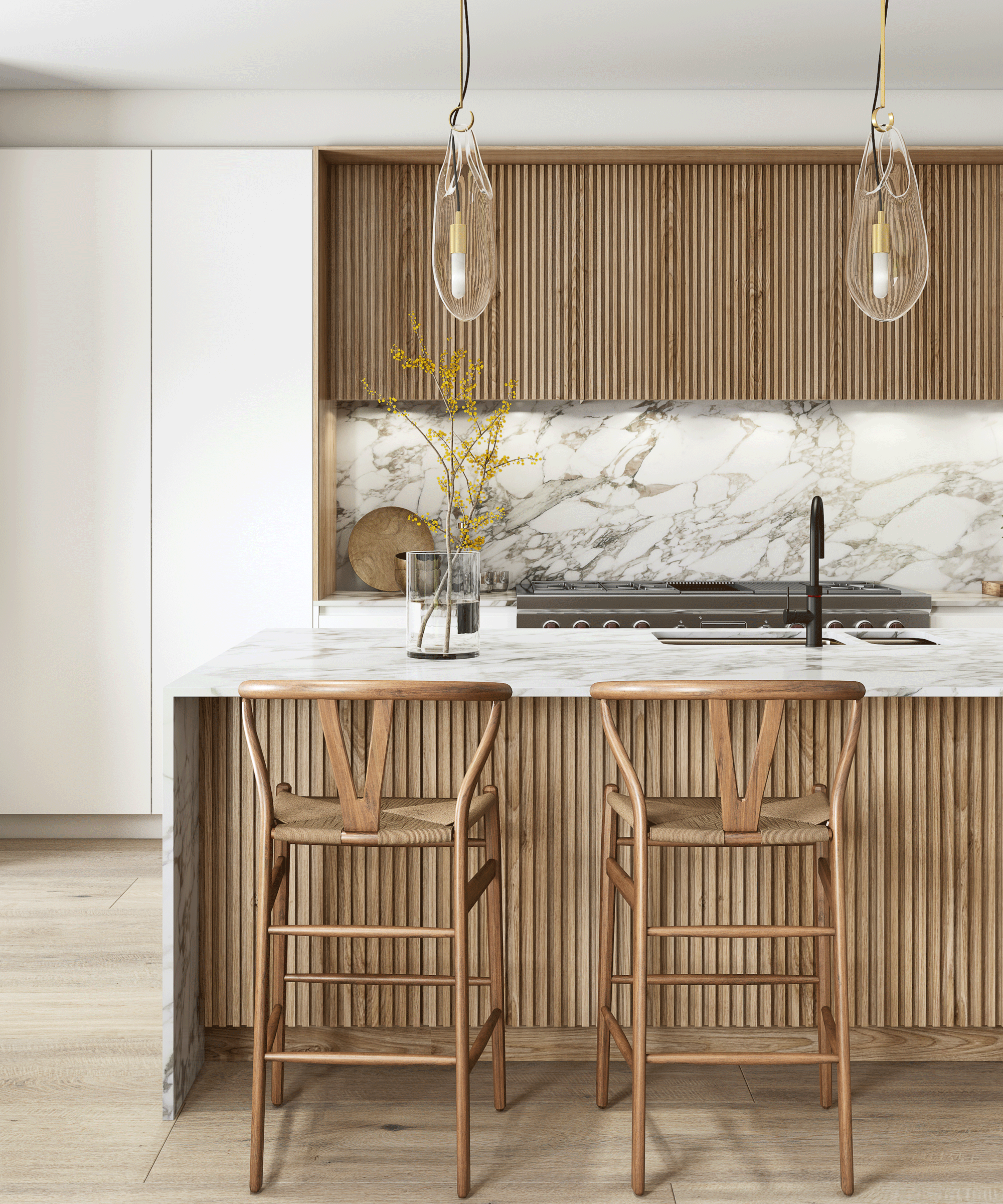 fluted wood cabinets with marble countertop and backsplash