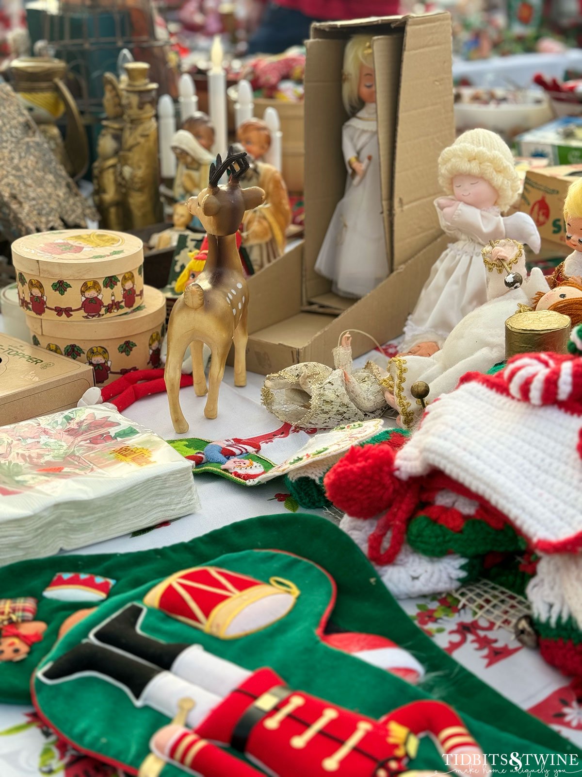 Antique Christmas reindeer and stockings at an antique fiar