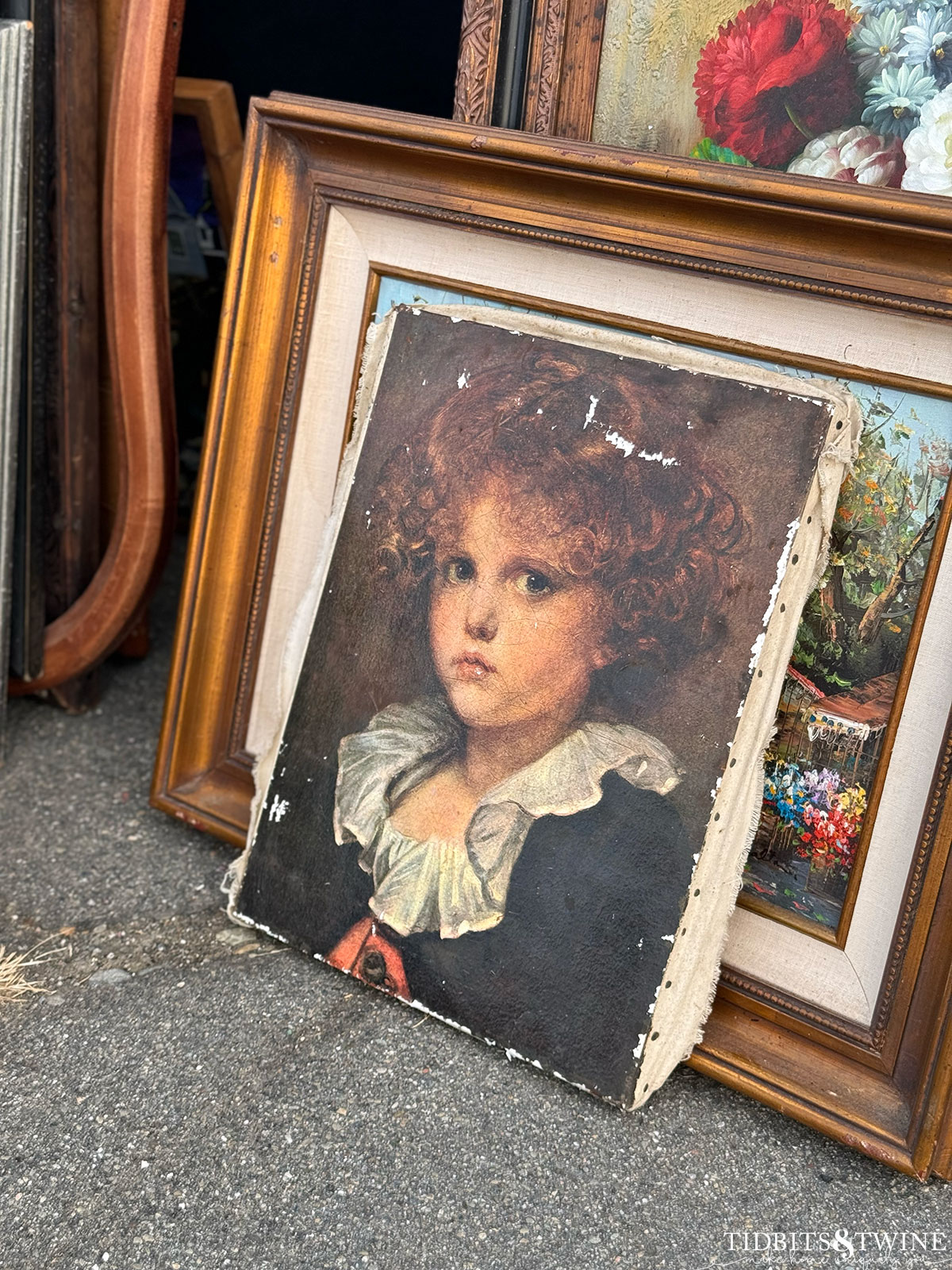 antique canvase portrait of a curly haired girl with a white ruffle collar