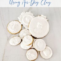 grouping of diy intaglios made of air dry clay with gold edges