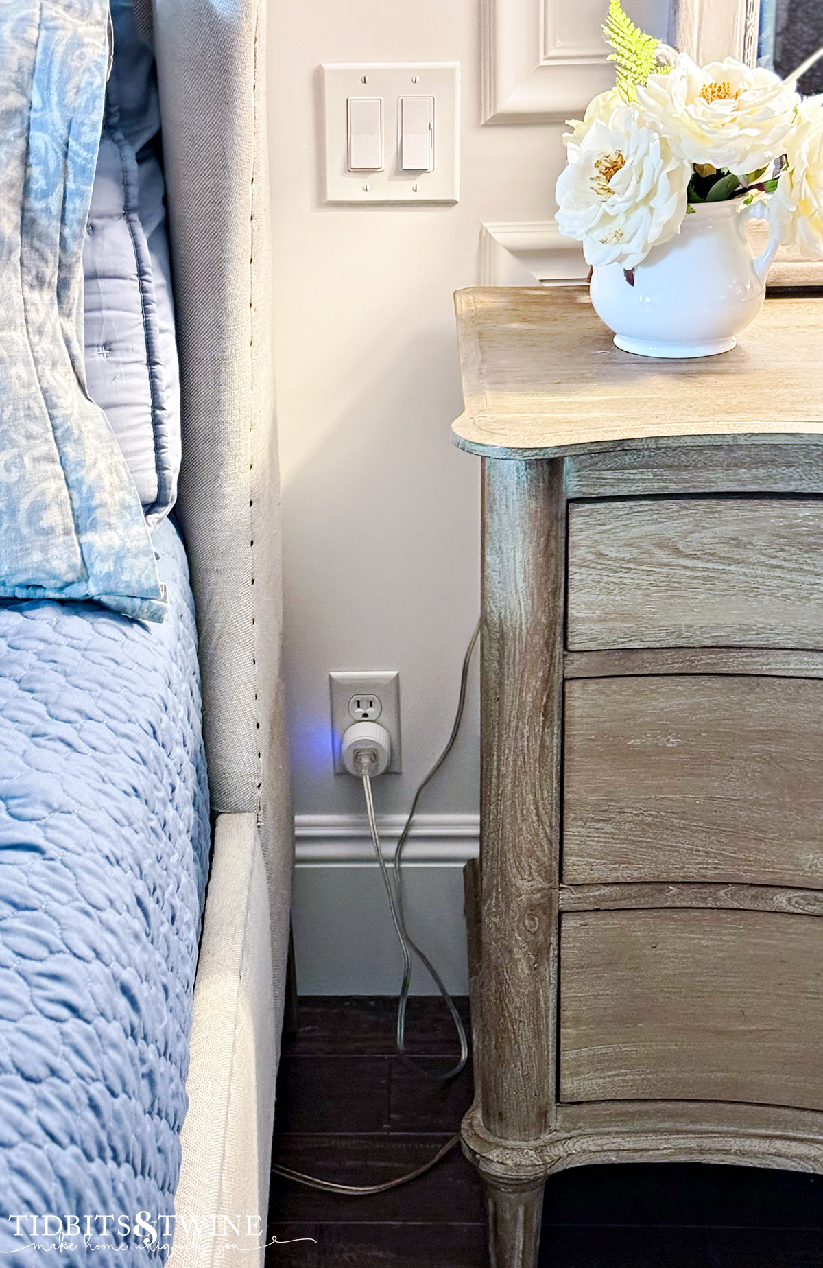 smart plug in wall between bed and nightstand - smart lighting solutions