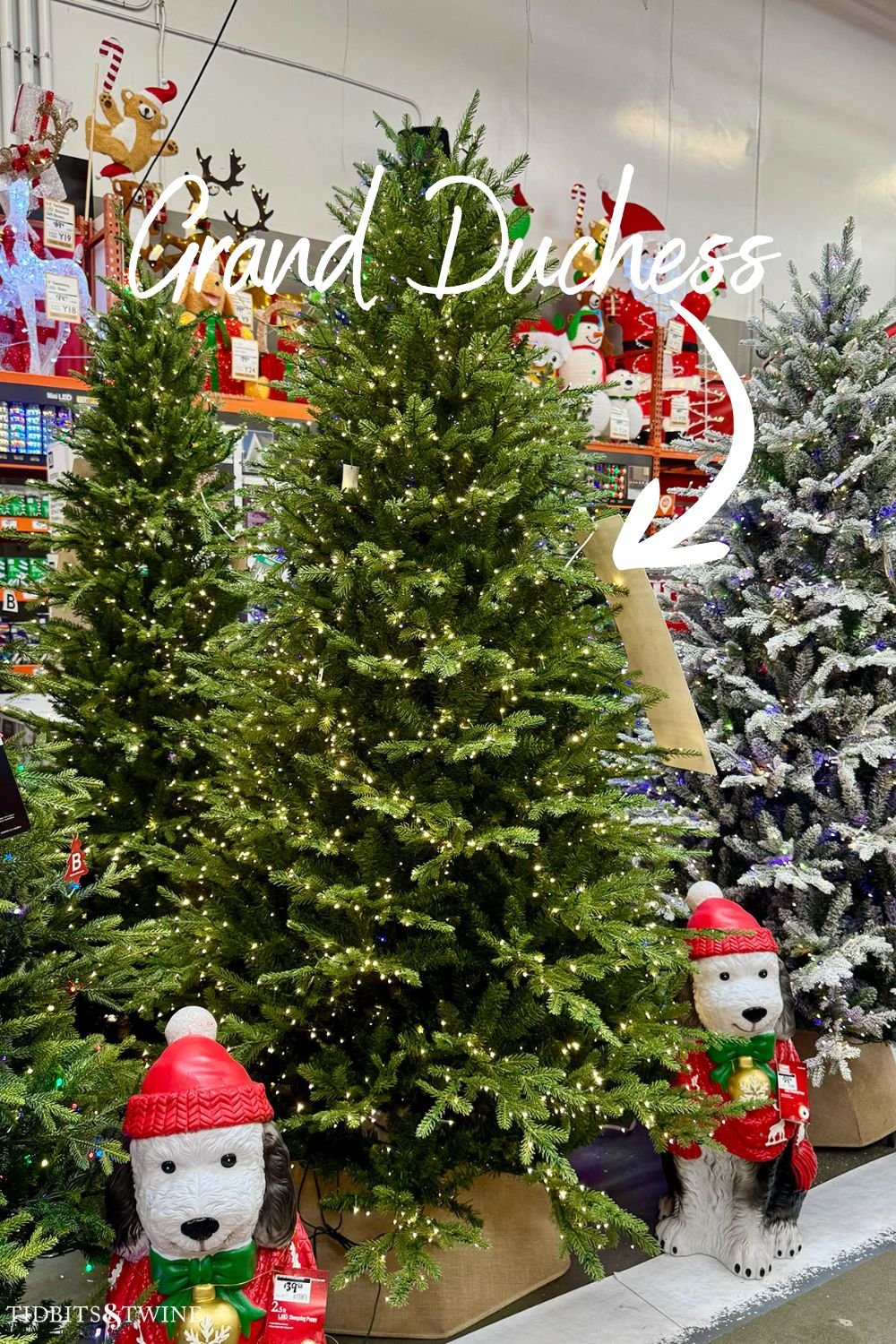 Home Depot Grand Duchess Balsam Fir pre-lit artificial Christmas tree display with warm LED lights.