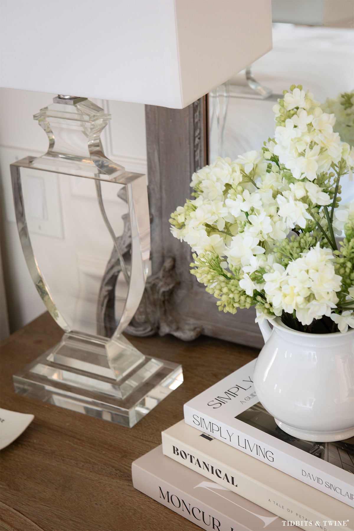Flowers on nightstand adding softness and texture to nightstand decorating