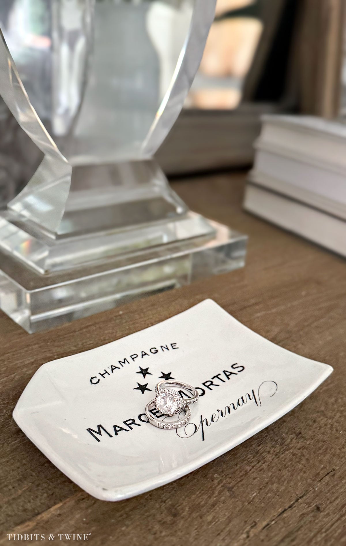 Nightstand decorating with small catch-all dish for jewelry and everyday items
