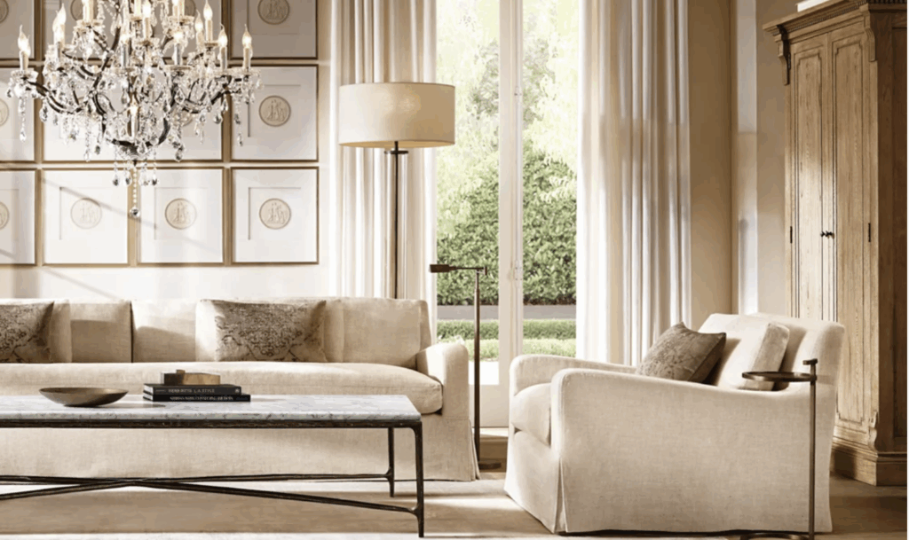 Restoration Hardware living room with linen upholstery, weathered wood furniture, and oversized European-inspired pieces